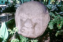 Carved monolithic head from Monte Alto, Guatemala, Pre-Columbian, Pre-Classic period, 1500-100 BC. Artist: Unknown