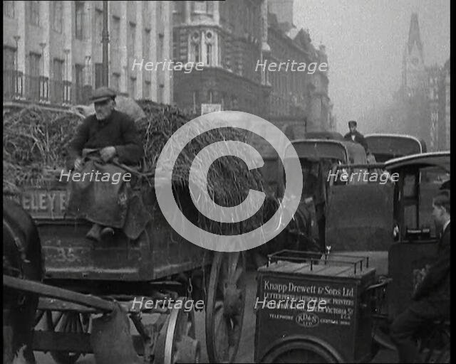 Horses and Carts Riding Through London, 1936. Creator: British Pathe Ltd.