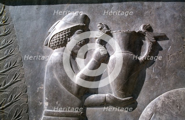 Relief of an Armenian man carrying a vessel, the Apadana, Persepolis, Iran