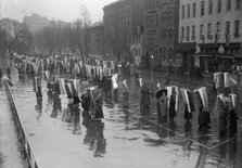Woman Suffrage - Marching in Rain, 1917. Creator: Harris & Ewing.