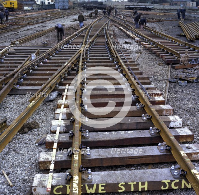 Engineers fabricating a rail junction for the Crewe South Junction before delivery, 1977. Artist: Michael Walters