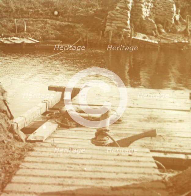 Post on the riverbank, Diksmuide, Belgium c1914-c1918. Artist: Unknown.