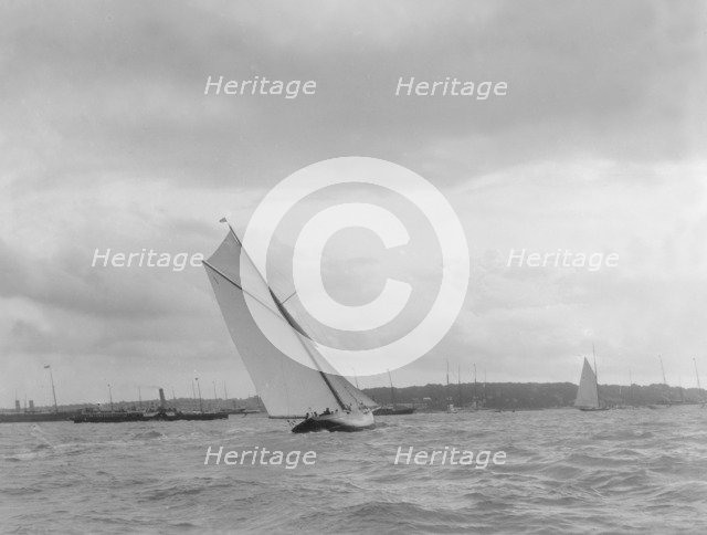 Cutter heeling hard on upwind leg. Creator: Kirk & Sons of Cowes.