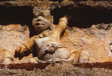 Guardian Spirit on Frieze on Outer Wall of the Tivanka Shrine, Polonnaruwa, Sri Lanka, 20th century. Artist: Unknown.