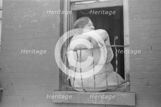 A tenant, 61st Street between 1st and 3rd Avenues, New York, 1938. Creator: Walker Evans.