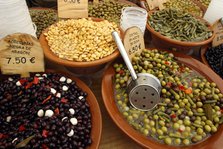 Market stall, Mallorca, Spain. Olives, beans and gherkins.