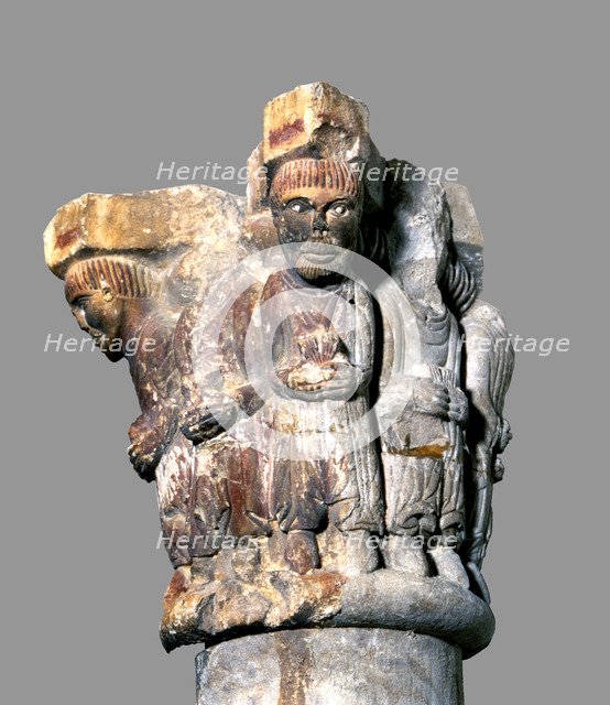 Capital with polychromed stone sculpture representing the abbot of Camprodon with the monastic co…