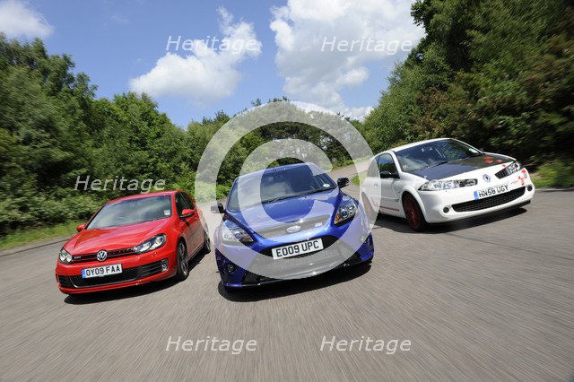 VW Golf GTi Renault Megane Sport R26R and Ford Focus RS 2009. Artist: Simon Clay.