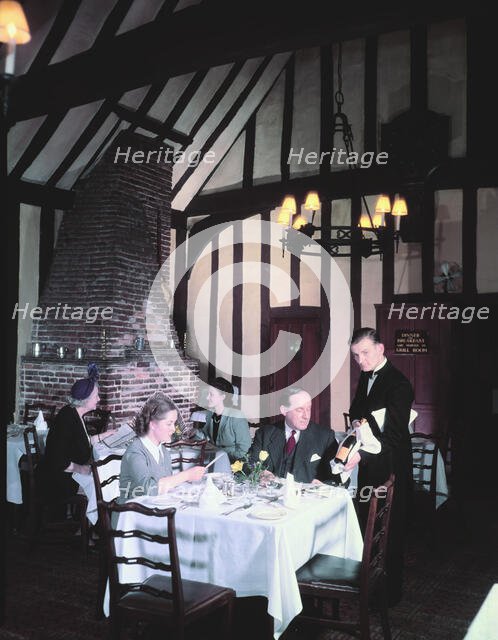 People dining at the Red Lion, Colchester, Essex, c1955-1965. Creator: Arthur Charles Kirby Ware.