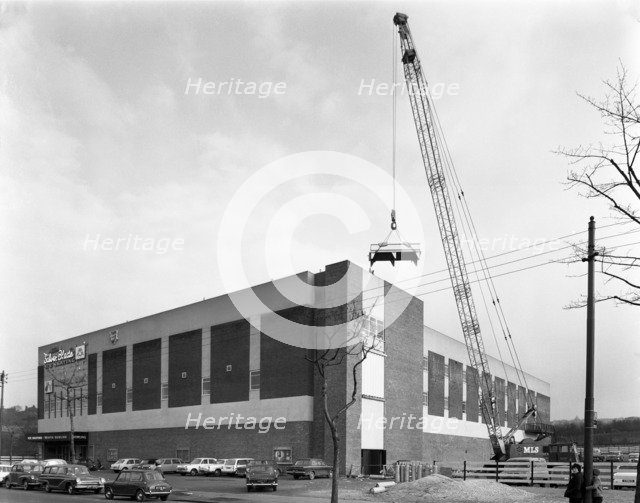 Lifting heat exchangers into place, Silver Blades Ice Rink, Sheffield, South Yorkshire, 1966. Artist: Michael Walters