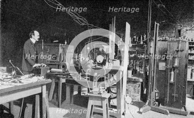 JJ Thomson, British physicist, at work in the Cavendish Laboratory, Cambridge. Artist: Unknown