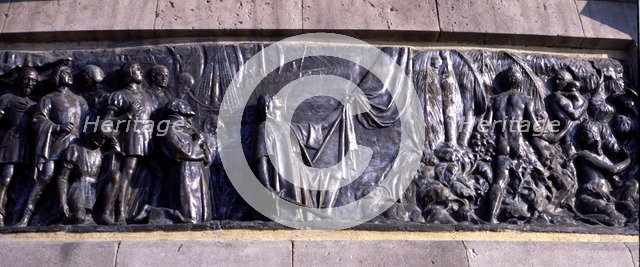 Detail of the bas-relief in the monument to Christopher Columbus in Barcelona, allegorical scene …