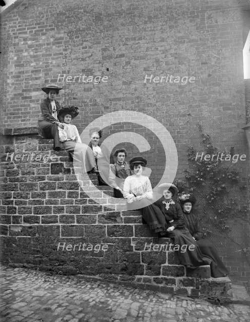 Women on steps, Hellidon, Northamptonshire, c1896-c1920. Artist: Alfred Newton & Sons