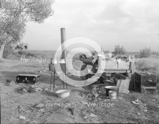 Migratory workers' "kitchen" near Shafter, Kern County, California, 1936. Creator: Dorothea Lange.