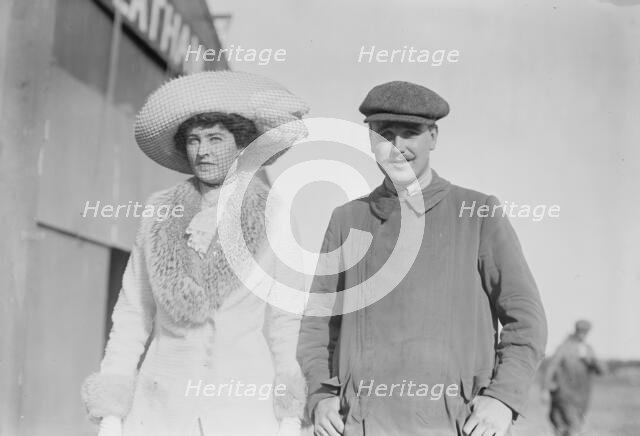 Mrs. Craig Biddle and J.A. Armstrong walking together, 1910. Creator: Bain News Service.