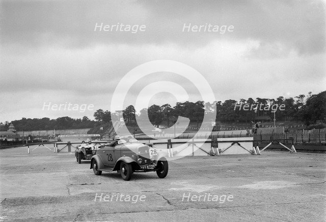 J Cleland's Ford V8 and JH Barker's Riley Lynx at the chicane, JCC Members Day, Brooklands, 1939. Artist: Bill Brunell.