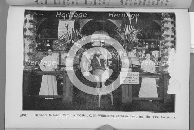 Entrance to North Carolina Exhibit, C. H. Williamson, Commissioner, and his two assistants, 1911. Creator: Unknown.