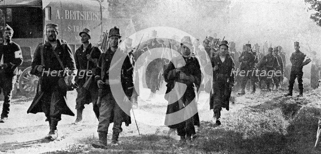 Belgian troops nearing the scene of battle, First World War, 1914. Artist: Unknown