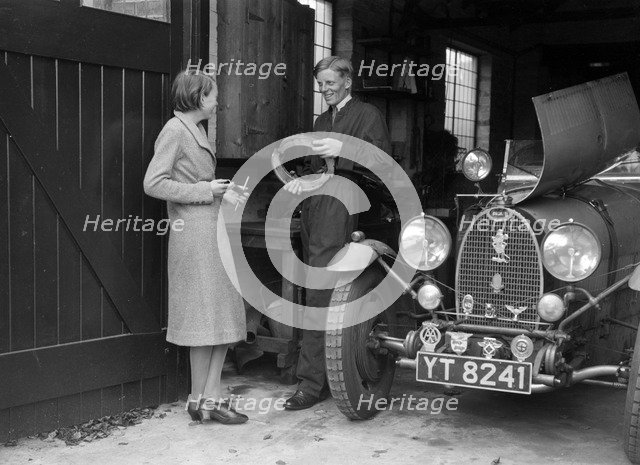 Denis Evans working on his Bugatti Type 43 2262cc. Artist: Bill Brunell.