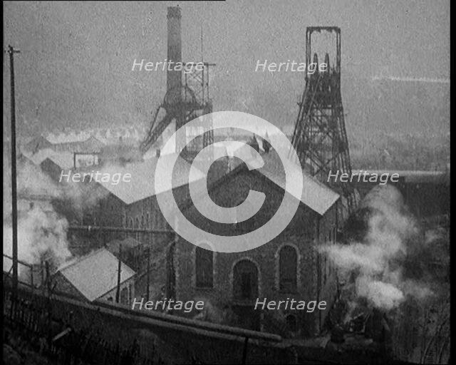 Views Over an Industrial Site in the United Kingdom. Chimney Stacks Are Smoking, 1921. Creator: British Pathe Ltd.