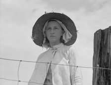 Farmer's daughter in the fields, farm in Georgia, 1937. Creator: Dorothea Lange.