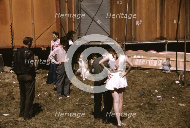 Backstage at the "girlie" show at the Vermont state fair, Rutland, 1941. Creator: Jack Delano.