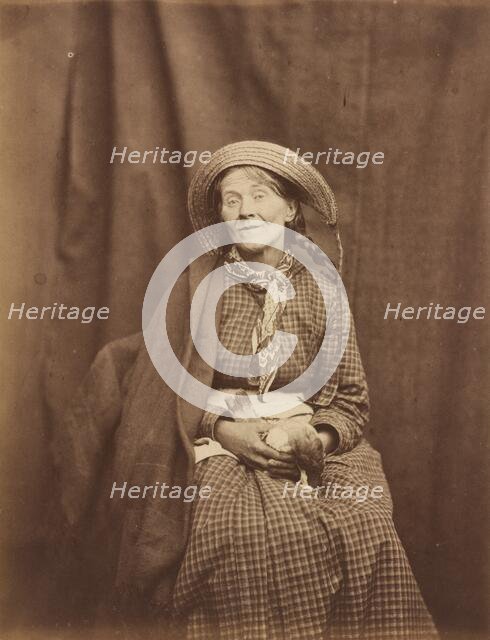 Woman Holding a Dead Bird, Surrey County Asylum, c. 1855. Creator: Dr Hugh Welch Diamond.