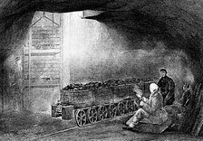 Bottom of a pit shaft in a coal mine with a train of loaded wagons, 1860. Artist: Unknown