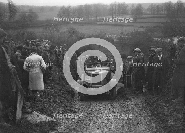 Morris Cowley of RJ Barker competing in the MCC Exeter Trial, Ibberton Hill, Dorset, 1930. Artist: Bill Brunell.