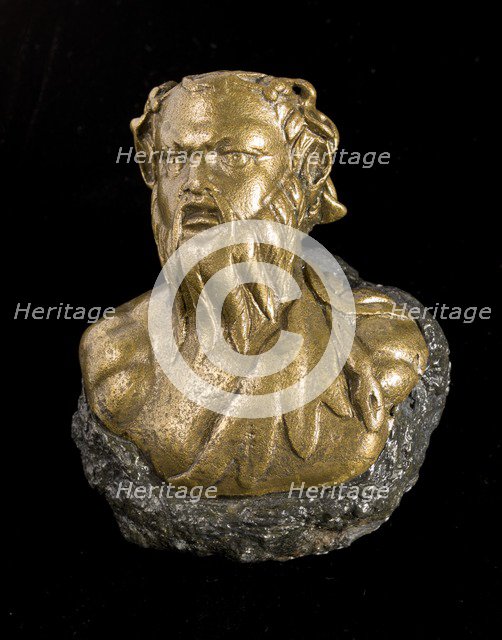 Roman steelyard weight in the form of a bearded satyr, found at Richborough Castle, Kent, 2012. Artist: Historic England Staff Photographer.
