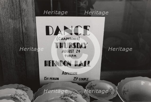 Poster in drugstore window, Syracuse, Kansas,  1939-08. Creator: Russell Lee.