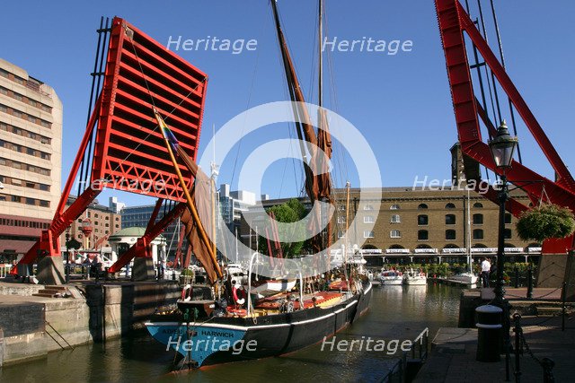 Barge passing through St Katherine's Lock, London
