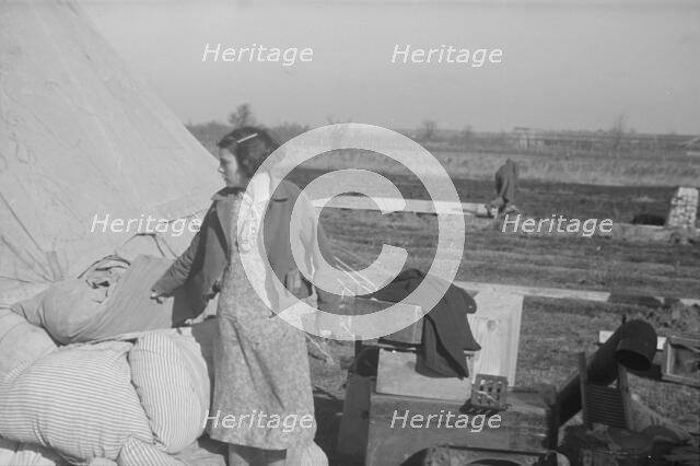 Possibly: A girl in the camp for white flood refugees, Forrest City, Arkansas, 1937. Creator: Walker Evans.