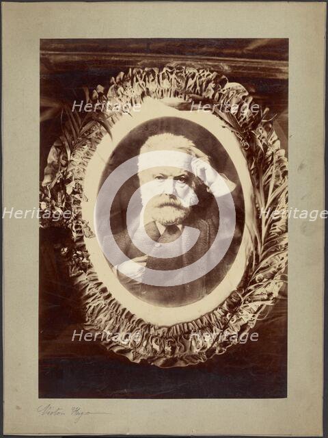 Portrait of Victor Hugo framed by wreath, about 1870-1885. Creator: Unknown.