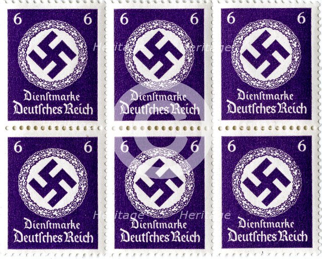 Set of postage stamps featuring a swastika emblem, 1941-1942. Artist: Unknown