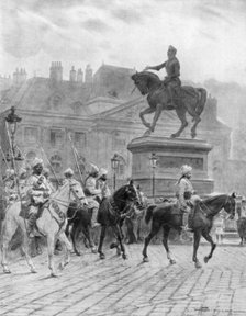 'Bengal Mounted Lancers passing the statue of Joan of Arc', France, 1914, (1926).Artist: J Simont