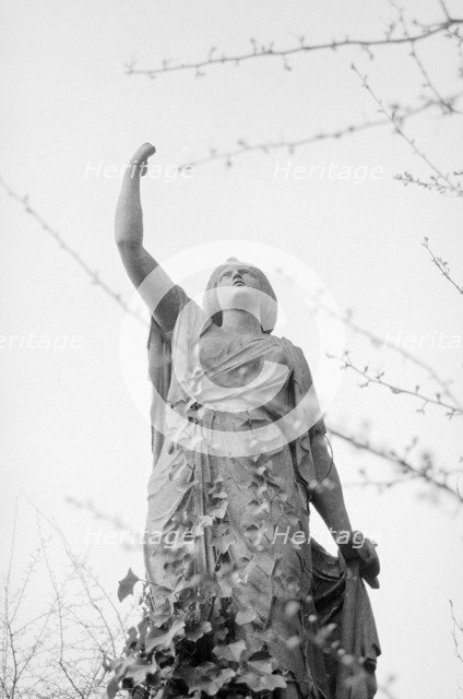 Statue, Highgate Cemetery, Hampstead, London, 1997. Artist: John Gay.