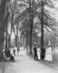 U.S. Naval Academy, Annapolis, Md. 1902?: midshipmen and visitors on grounds, (1902?). Creator: Frances Benjamin Johnston.