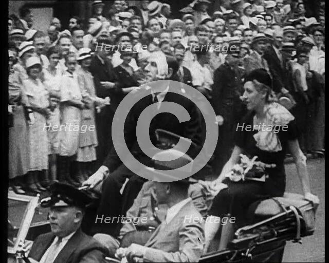 Crowd Watching Jim and Amy Mollison Sitting in a Car , 1933. Creator: British Pathe Ltd.