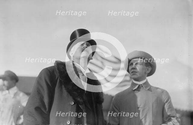 W. Wellman with unidentified gentleman at aviation meet, 1910. Creator: Bain News Service.