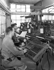 Monotype keyboards in operation at a printing company, Mexborough, South Yorkshire, 1959. Artist: Michael Walters