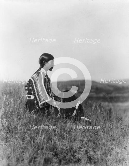 Day dreams-Piegan, c1910. Creator: Edward Sheriff Curtis.