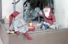 Christmas brownies on a mantelpiece, 1960s. Artist: Göran Algård