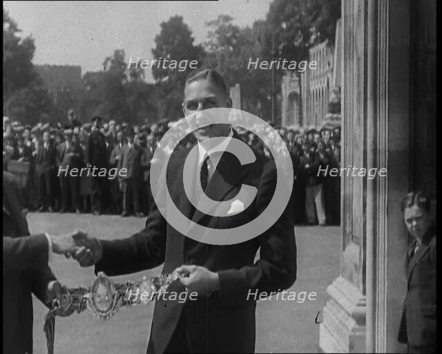 Boxer, Jack Petersen Accepting a Boxing Award Belt, 1930s. Creator: British Pathe Ltd.