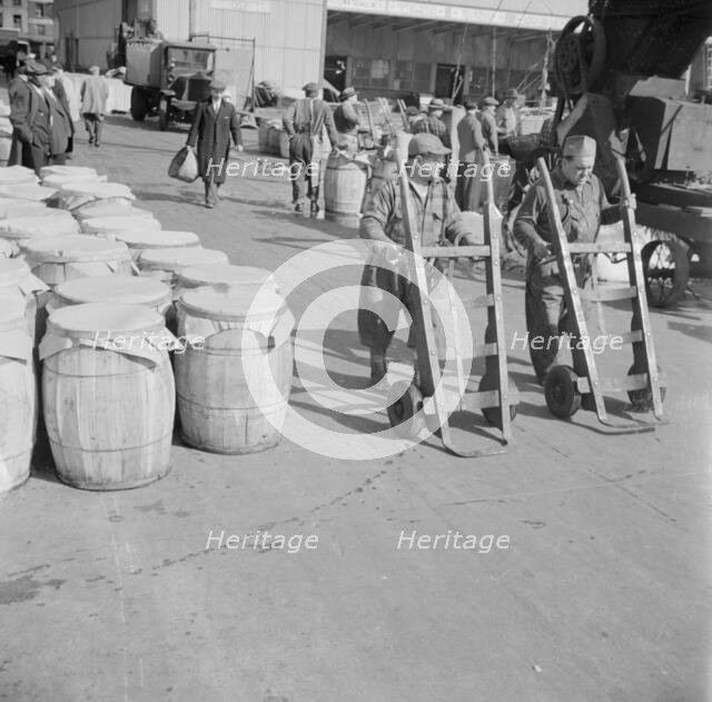 Dock scene, Fulton fish market, New York, 1943. Creator: Gordon Parks.