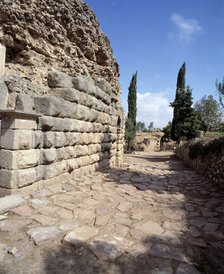 Roman Theatre of Mérida, remains of the road that gave access to the entrance vomitoriums of the …