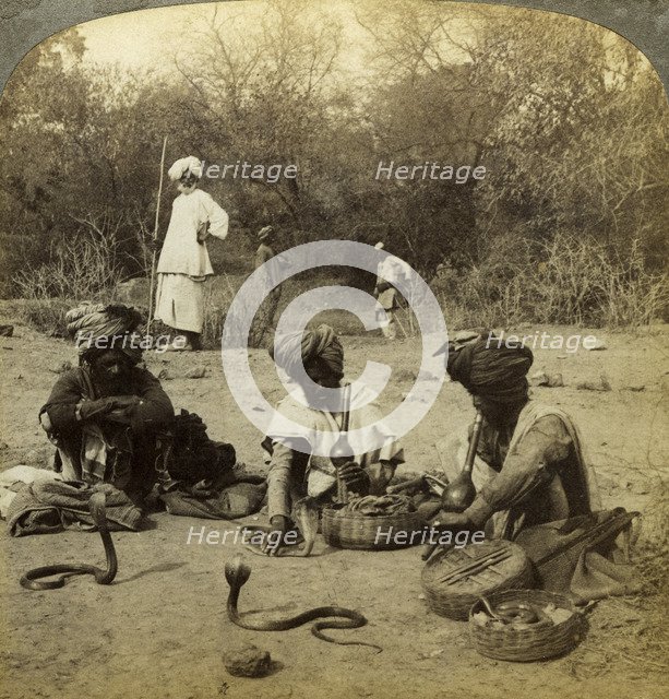 Snake charmers, Delhi, India.Artist: Underwood & Underwood