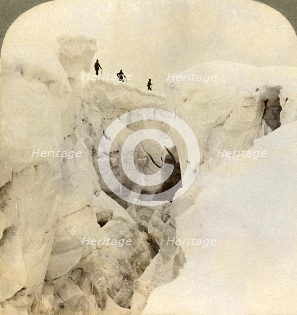 'Descent of Mt. Blanc - enormous crevasses near the summit, Alps', 1901. Creator: Underwood & Underwood.