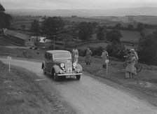 Austin 10 saloon of WS Sewell competing in the South Wales Auto Club Welsh Rally, 1937 Artist: Bill Brunell.