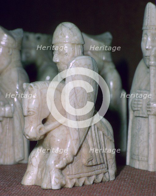 A Knight - The Lewis Chessmen, (Norwegian?), c1150-c1200. Artist: Unknown